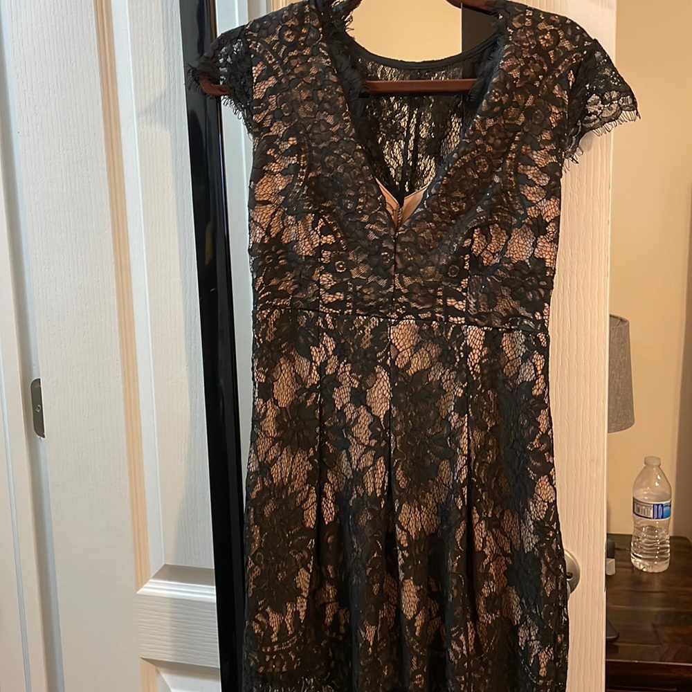 Black lace dress with nude underlay